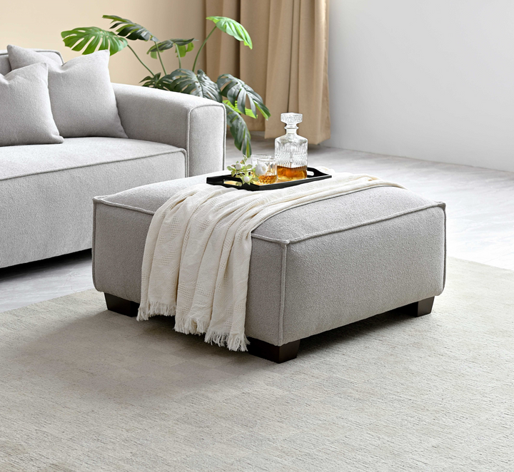 Dakota 4 Seater with Chaise in Pebble Boucle With Footstool